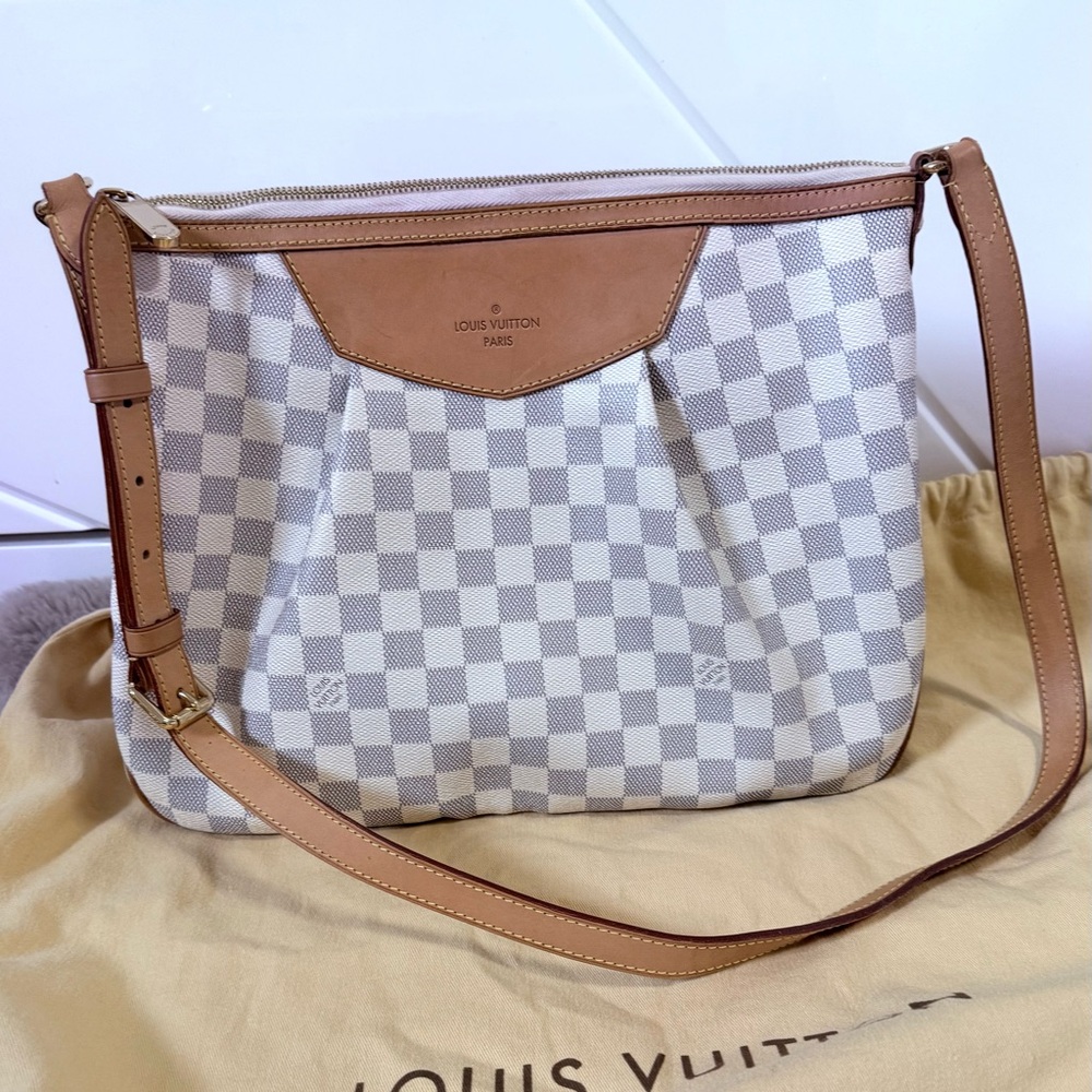Authentic Louis Vuitton Siracusa crossbody bag
